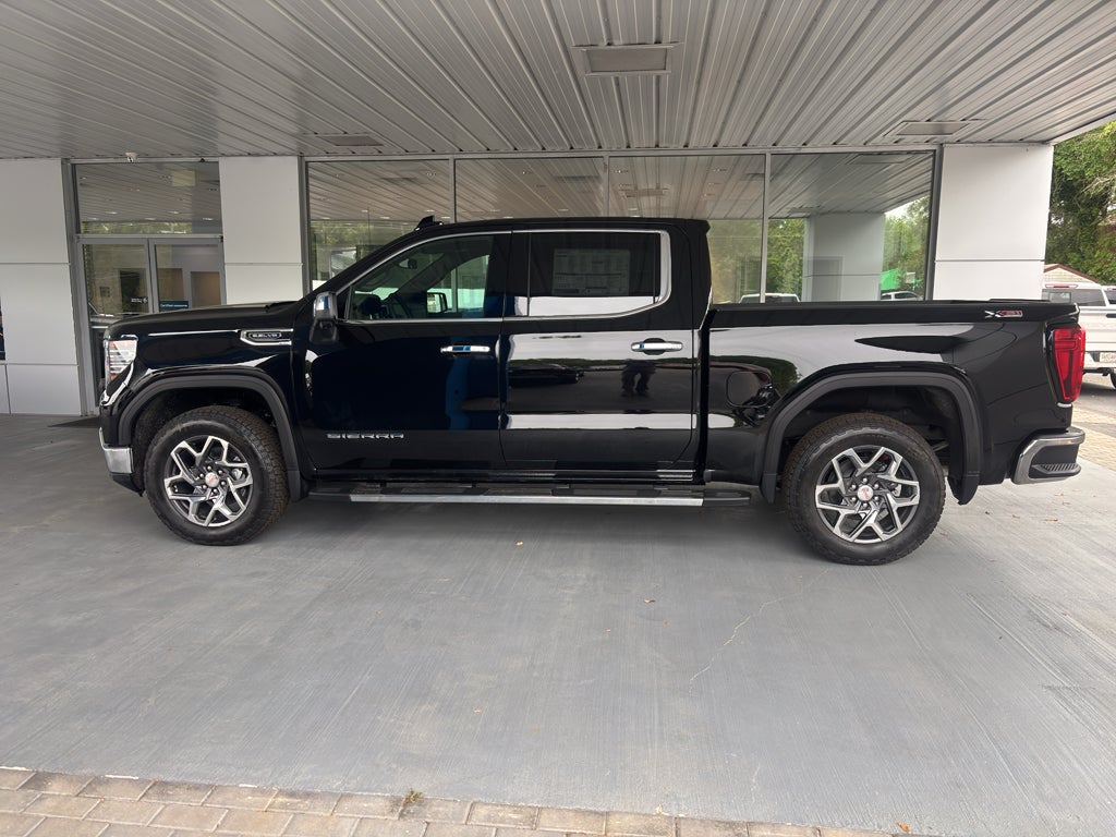 2026 GMC Sierra 1500 SLT in Onyx Black — front three-quarter view