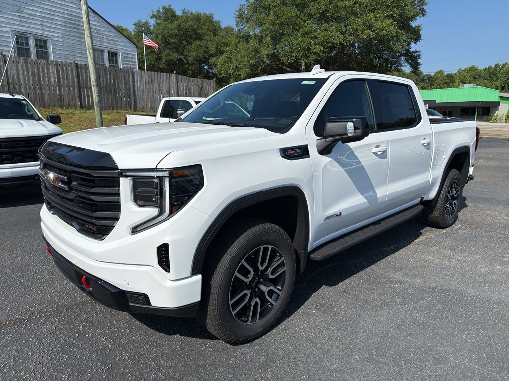 2026 GMC Sierra 1500 AT4 in Summit White — front three-quarter view