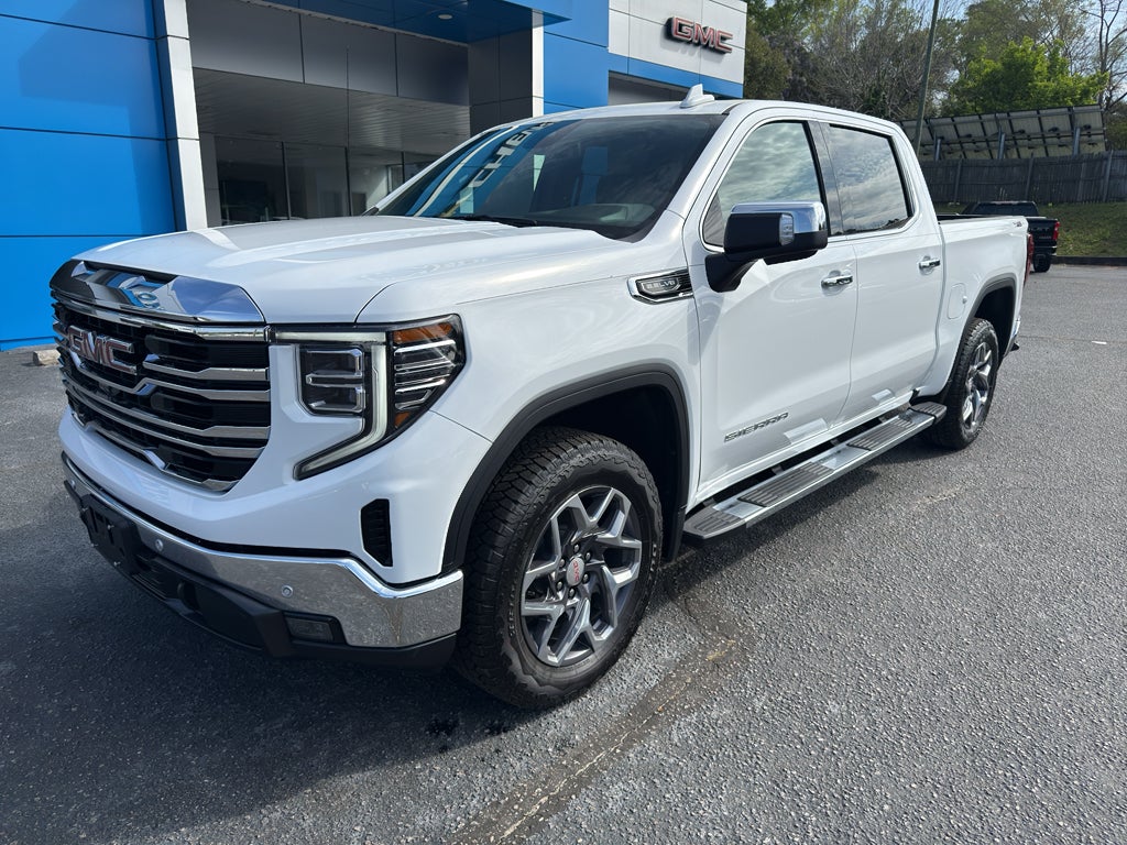 2026 GMC Sierra 1500 SLT in Summit White — front three-quarter view